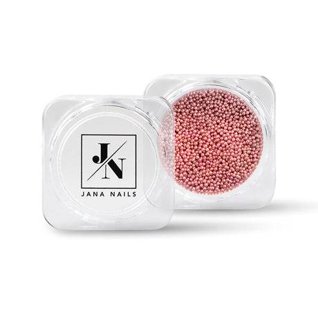 Perles de Caviar Rose for nail decoration in a clear container.