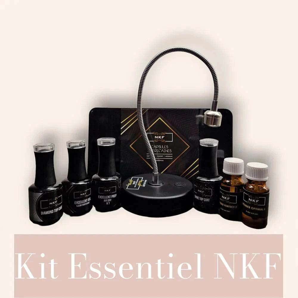 Kit Essentiel Capsules NKF with nail extension products, mini LED lamp, and natural square medium capsules.