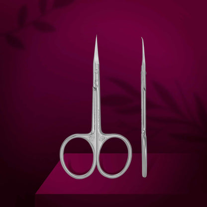 Staleks Ciseau Cuticules Exclusive 21 Magnolia with curved handles and sharp tips.